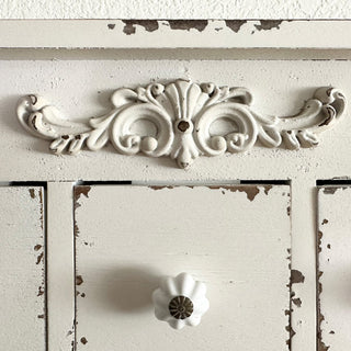 Farmhouse drawer fronts with ceramic knobs and metal hooks