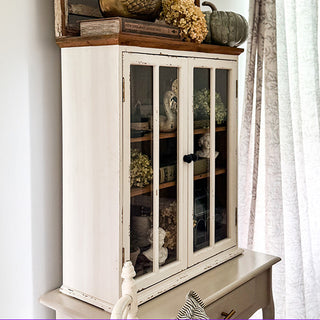 Side view of rustic farmhouse cabinet with glass doors