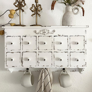 Christmas styled farmhouse wall cabinet with red mugs