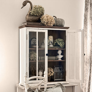Rustic farmhouse display cabinet with distressed white wood