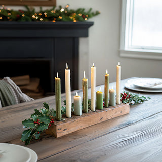 Holiday dining table decorated with recycled wood nine-taper candelabra