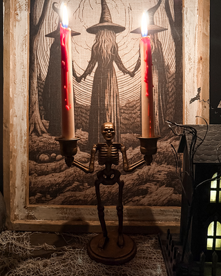 Sculpted Skeleton Taper Candle Holder