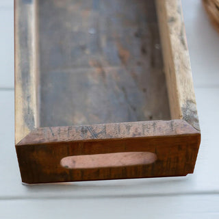 Close-up of rustic recycled wooden serving tray