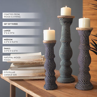 Three wood and rope candle holders display