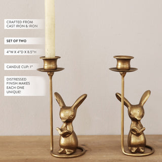 Decorative brass bunny candle holders on coffee table
