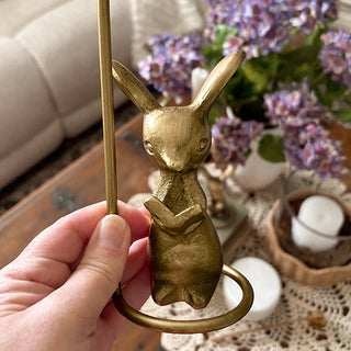 Gold rabbit taper candle holders styled on books
