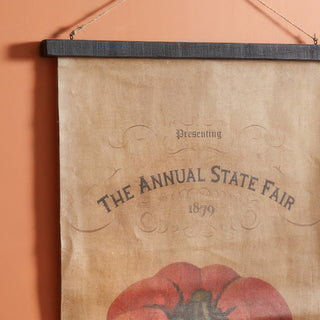 Close-up of Annual State Fair vintage pumpkin wall canvas with distressed antique finish and wooden frame
