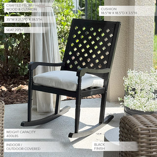 Modern black outdoor rocking chair on patio