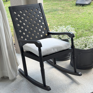 Close-up black lattice wood rocking chair backrest