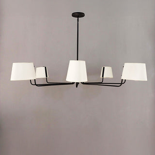 Black iron chandelier with white fabric shades showing full width and elegant design