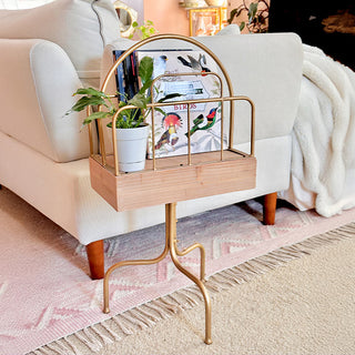 farmhouse style bedside table with integrated phone charger and book storage

