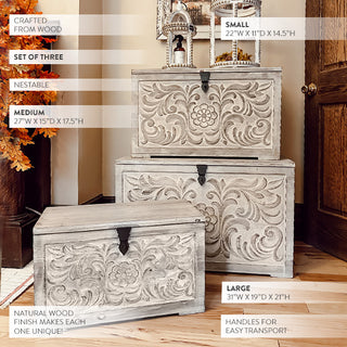 Set of three carved wood decorative storage chests