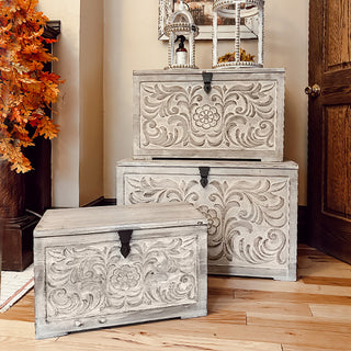 Stacked carved wood chests for home décor storage
