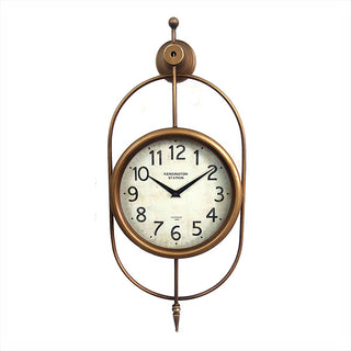 Full view of Kensington Station oval frame wall clock with pointed bottom finial on white background