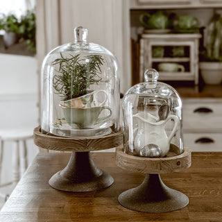 Glass cloche set with pitcher and teacup display