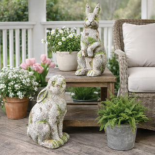 Faux concrete rabbit garden statues on rustic porch decor