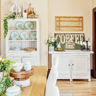 White farmhouse sideboard styled with hutch and decor