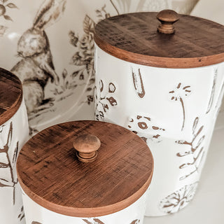 Distressed wood lid mushroom canister farmhouse decor close-up