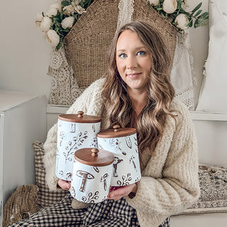 Woman holding mushroom canister set farmhouse home decor