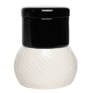 Back view of white dolomite nutcracker cookie jar showing textured surface detail and rounded body shape for ample cookie storage