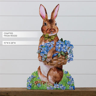  Wooden bunny cutout figure holding blue hydrangea basket showing 15 inch width by 28 inch height dimensions with shiplap wall background