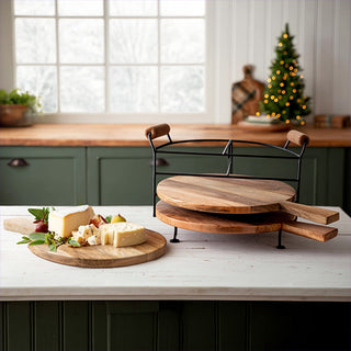 Rustic wood cutting boards with metal stand in kitchen