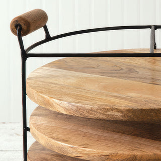 Close-up wood cutting boards and metal stand handle