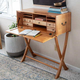 Open drop-front secretary desk revealing organized workspace with multiple storage compartments