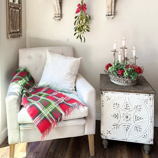Side view of architectural salvage side table showing textured aged finish