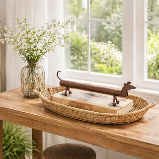 Farmhouse table styling with woven tray and dog decor