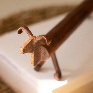 Close-up rustic iron dog figurine home accent