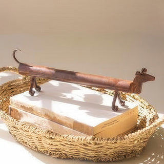 Distressed metal dachshund decor on woven tray