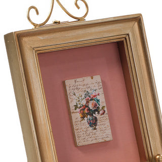 Closeup gold frame floral art vintage home decor