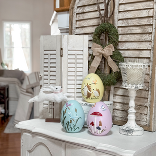 Rustic spring vignette with decorative Easter eggs