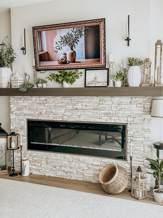 lanterns on a fireplace mantel