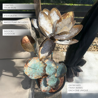 Distressed metal lotus water fountain close-up