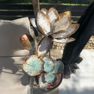 Distressed metal lotus fountain product close-up