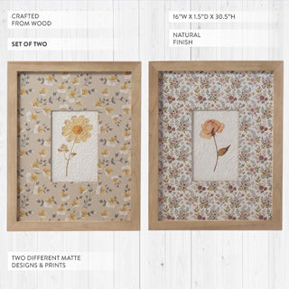 Set of two natural wood framed floral art pieces showing yellow and rust flower prints with decorative matte