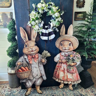 bunny signs in front of black door with spring wreath easter decor and spring decor