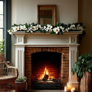 Faux magnolia and spruce Christmas garland for fireplace mantel