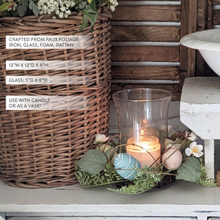 Rustic glass candle holder with faux florals and eggs