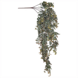 Hanging garland styled on wooden console with dramatic trailing vines