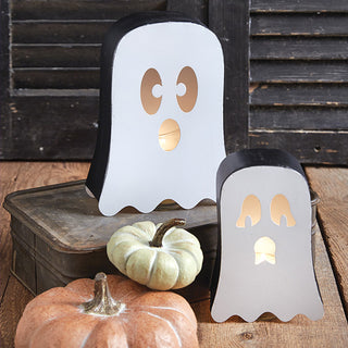 Large and small ghost metal candle holders with pumpkins, farmhouse-style Halloween decorations for home