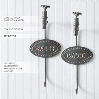 Set of two distressed silver cast iron bath hooks