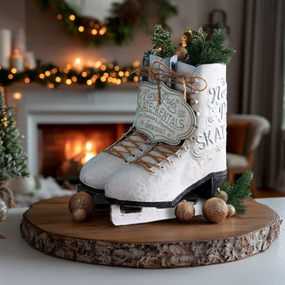 Festive North Pole skate rentals Christmas decoration with greenery and ornaments, displayed on a wood slice stand with a holiday fireplace background.