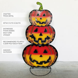 Metal jack-o’-lantern pumpkin stack decoration