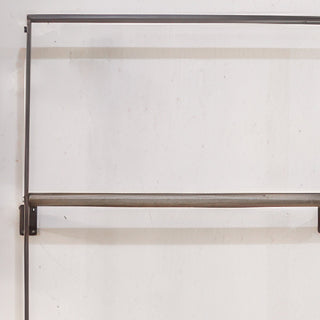 Close-up detail of wood pole rungs on metal frame blanket ladder showing quality construction