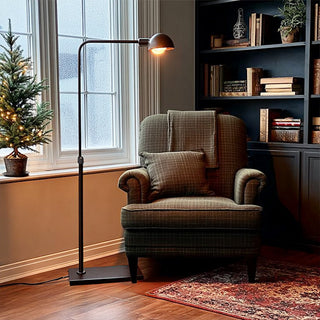 Cozy reading nook with modern black floor lamp