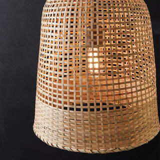 Bohemian woven grass ceiling light illuminated showing warm ambient glow