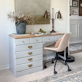 Bronze adjustable desk lamp on white painted desk with vintage brass drawer pulls